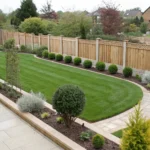 A modern wooden privacy fence is a stylish idea for a backyard.