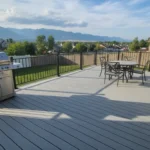 Custom deck railing framing a Utah mountain view